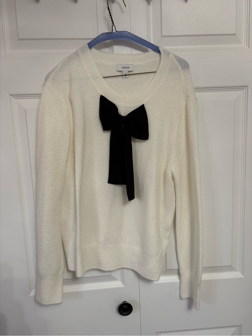 CeCe Cream Crewneck Sweater with Black Bow